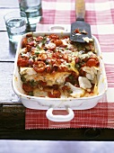 Fish lasagne with capers and cherry tomatoes