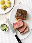 Rump steak with herb butter and potatoes
