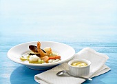 Bouillabaisse and a dish of aioli (France)