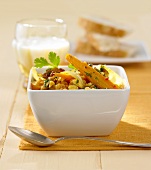 Carrot curry with red lentils, raisins and almonds