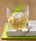Pineapple sorbet with ginger and whipped cream