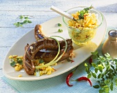Sausages with mango and chilli salad