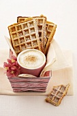 Apple and nut waffles and a cup of cappuccino