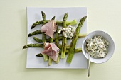 Green asparagus with ham and egg & sheep's cheese sauce