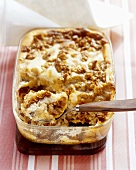 Honey cake pudding with apples and nuts