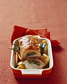 Stuffed loin of pork with roasted vegetables