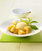Pineapple fritters with honey and ice cream (Thailand)