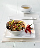 Beef fillet with mushrooms, spring onions and chilli