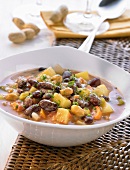 Potato and bean stew with peanuts and coriander