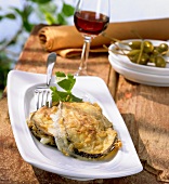 Aubergine & cheese sandwiches with capers & a glass of red wine