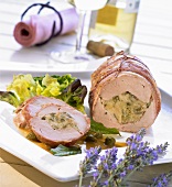 Pork fillet with herb and onion stuffing and caper sauce