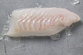 A slice of fresh cod fillet