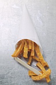 Sweet potato chips in a greaseproof paper cone