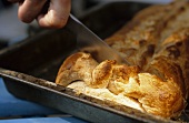 Puff pastry with quark filling on baking tray