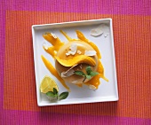 Coconut and lime panna cotta with mango puree