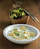 Potatoes & cucumber in cultured milk with warm endive salad