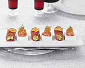 Tuna rolls and smoked salmon with sour cream jelly