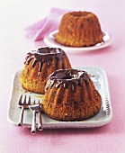Small gugelhupfs with chocolate icing