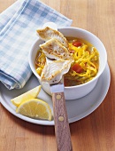 Cabbage soup with saffron threads and strips of sole