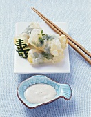 Coley in rice paper with chilli yoghurt sauce