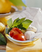 Still life with mozzarella, tomatoes and basil