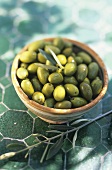 A bowl of pickled green olives