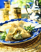 Deep-fried brick pastry parcels with tuna and egg filling