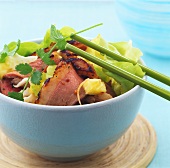Duck breast, baby pineapple, celery and ginger with lettuce