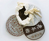 Cakes of compacted Chinese Pu-ehr tea
