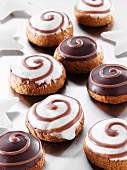 Silesian 'pepper nut' biscuits with a chocolate glaze and icing sugar