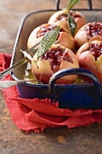 Baked apples filled with jam and nuts