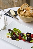 Beetroot salad with raspberries and hazelnuts