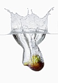 A fig falling into water