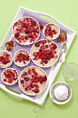 Baked vanilla cream with cherries and redcurrants