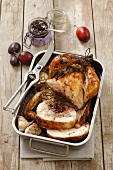 Roast chicken with a plum stuffing
