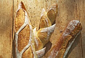 Baguettes on a wooden surface