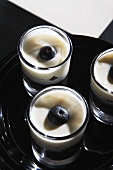 Layered desserts with blueberries and vanilla pudding