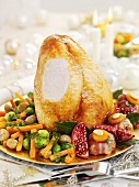 Turkey with vegetables and pomegranates for Christmas dinner