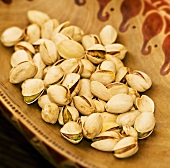 Pistachios in a wooden bowl