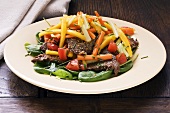 Beef with mango, vegetables and sesame