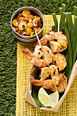 Prawn kebabs with physalis and tomato salsa