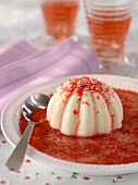 Yogurt pudding with strawberry sauce