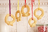 Biscuit rings hanging up as Christmas decorations