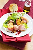 Spicy salad with spiced baked apple and smoked goose breast