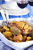 Roast pork with apples and potatoes