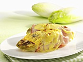 Chicory au gratin with ham and cheese