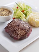 Beef steak with pepper sauce