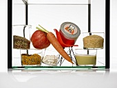 Assorted foods in a glass case