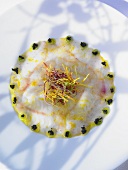 Fish carpaccio with shredded vegetables