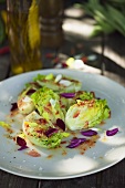 Lettuce hearts with edible flowers